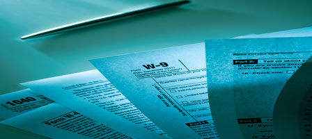 w-9 tax papers on a desk