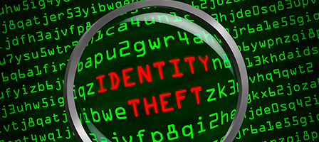 a magnifying glass looking at identity theft in 