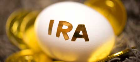 an egg with ira written on it in gold