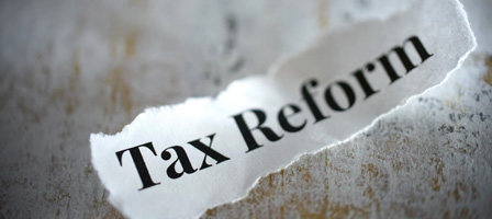 a piece of paper that says tax reform on it