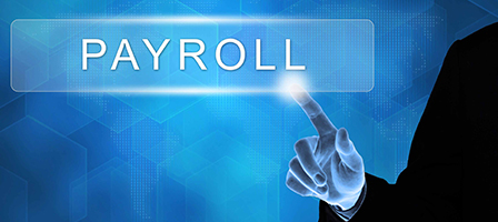 a person pressing a button that says payroll